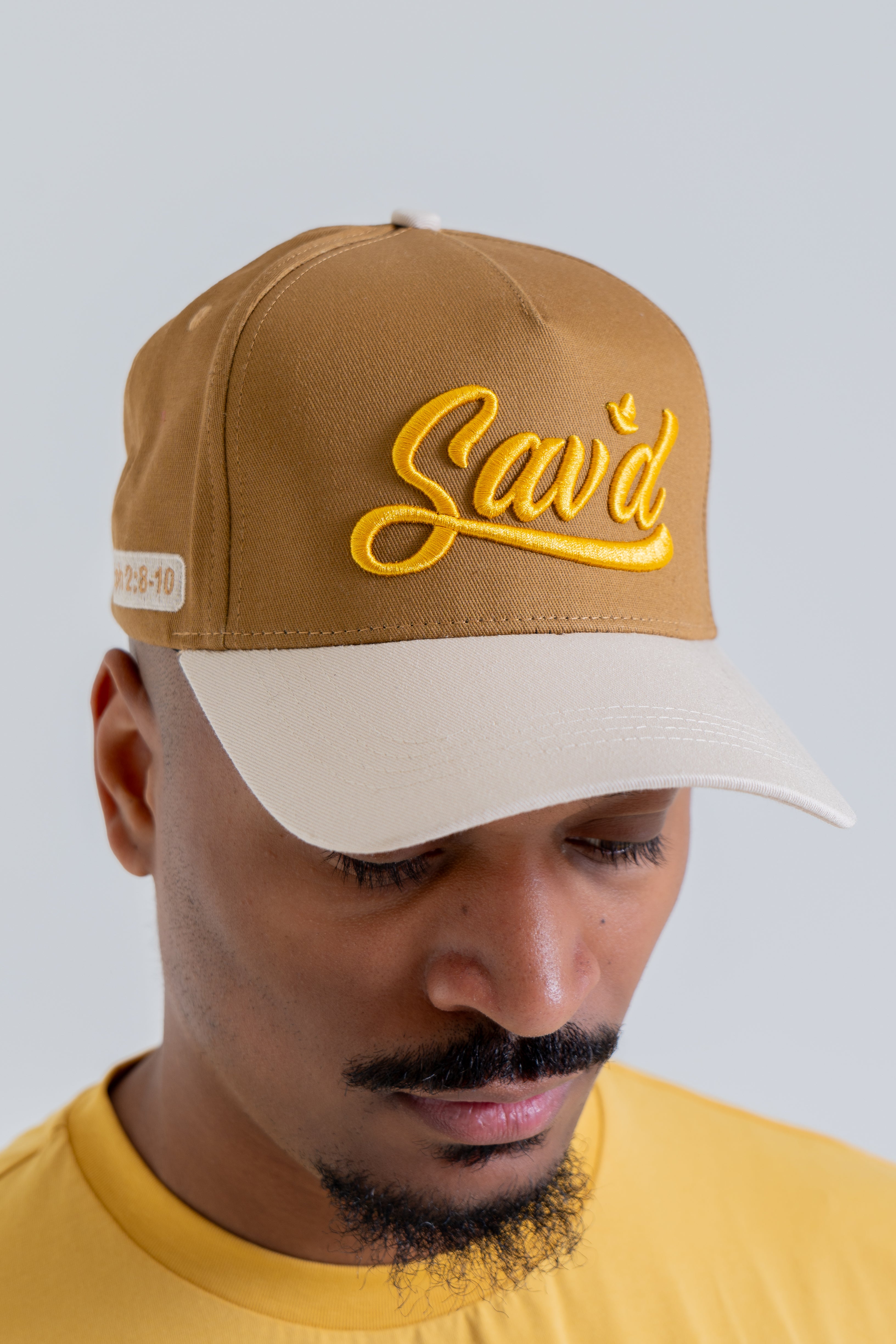 Sav'd By Grace Snap Back Hat -Mocha w/ Gold Sav'd By Grace Snap Back Hat -Mocha w/ Gold